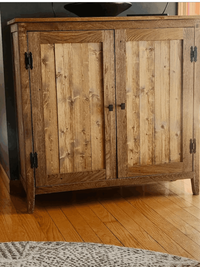 Wooden cabinet on hardwood floor.